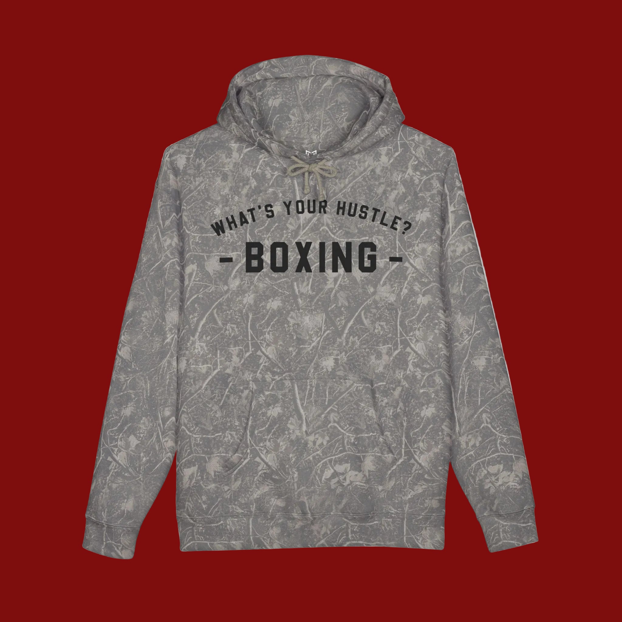 A gray camouflage hoodie with a black graphic print on the chest that reads 'WHAT'S YOUR HUSTLE? BOXING - BOXING -'. The hoodie is shown flat against a plain white background.