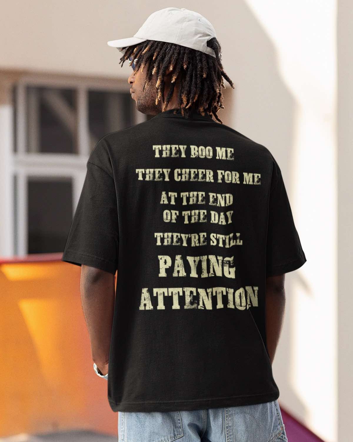 "THEY BOO ME, THEY CHEER FOR ME, THEY'RE STILL PAYING ATTENTION" BOXY T-shirt | 3 Colors | WHAT'S YOUR HUSTLE?®