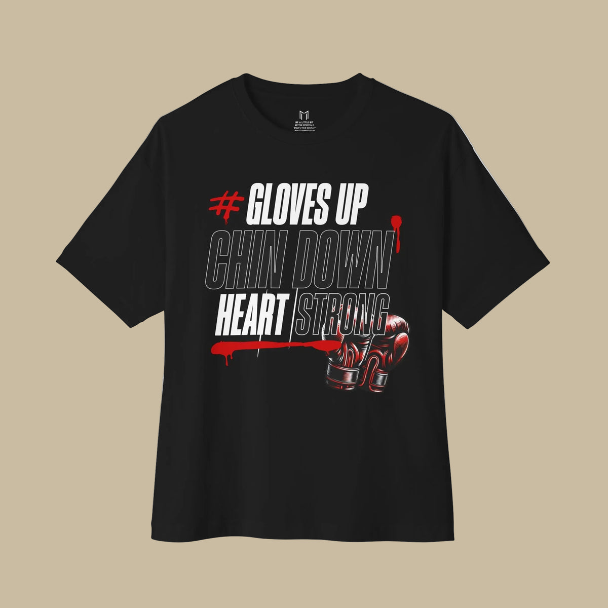 A black short-sleeve graphic t-shirt featuring the text '# GLOVES UP CHIN DOWN HEART STRONG' in white and red, with a graphic of a boxing glove on the front, displayed against a solid white background.