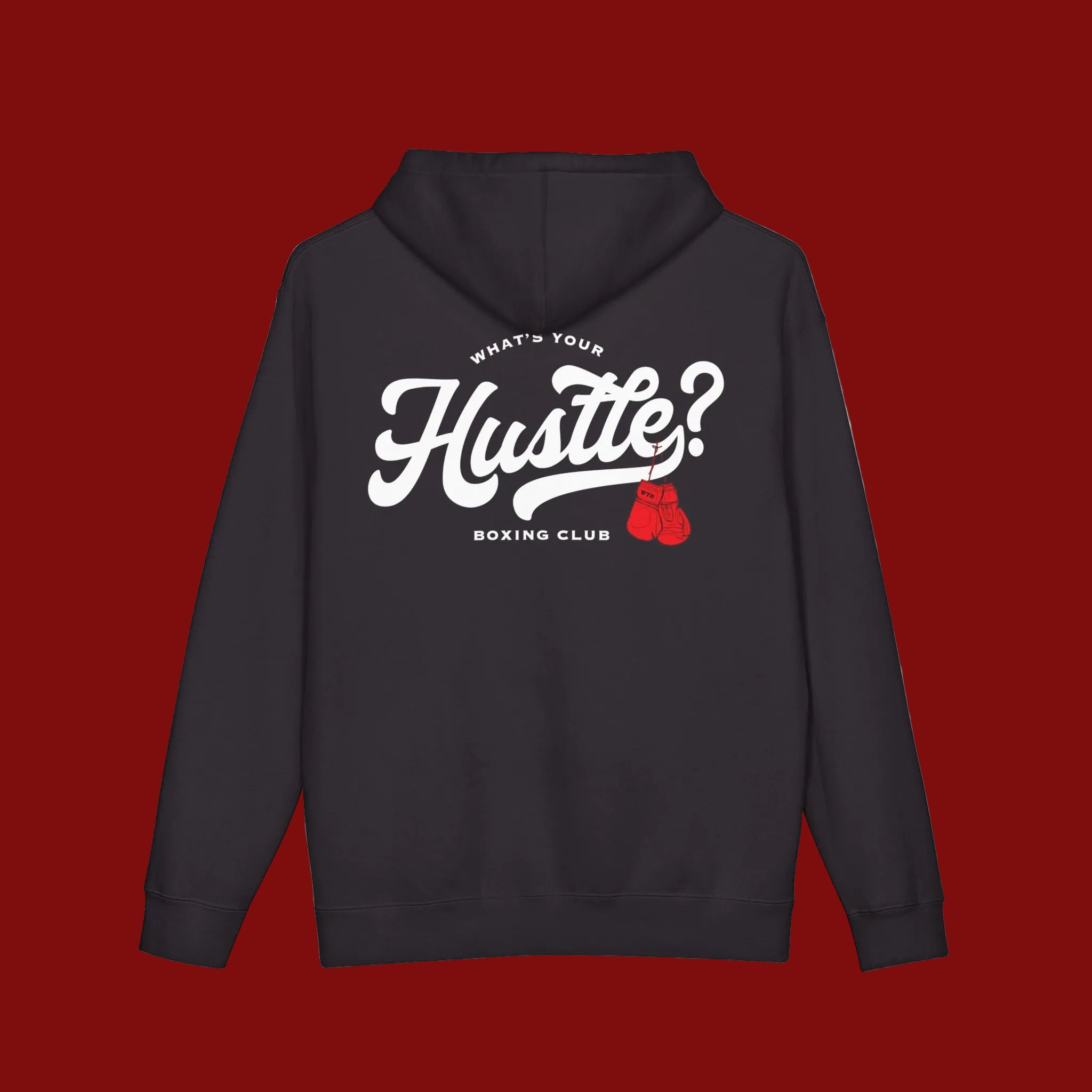 A black pullover hoodie shown from the back, featuring a large white graphic that reads 'Hustle?' with 'WHAT'S YOUR' above and 'BOXING CLUB' below, plus a small red boxing gloves accent.